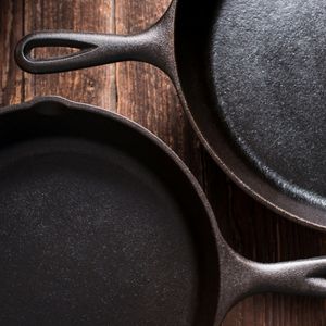 top view of 2 cast iron skillets for how to season cast iron skillet