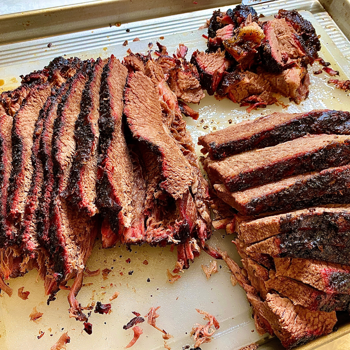 top view of sliced cooked brisket to show what part of cow is brisket