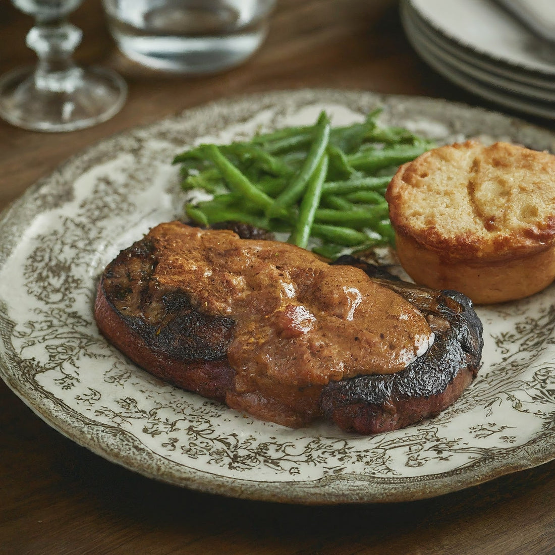 Steak Diane meal on a decorated plate