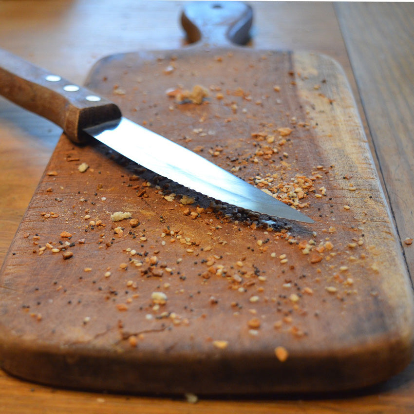 Wooden cutting board and knife