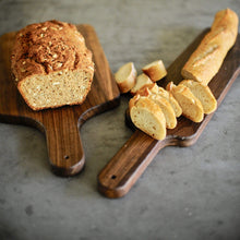 Perfect bread boards sliced and displayed on Black American Walnut